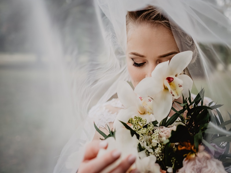 Bride with orchid bouquet